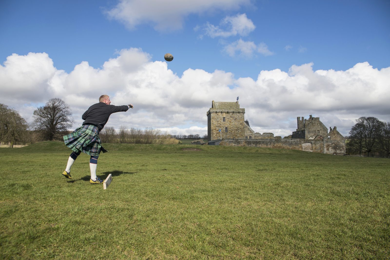 Scotland Corporate Travel Team Building - Highland Games, Shot Put 